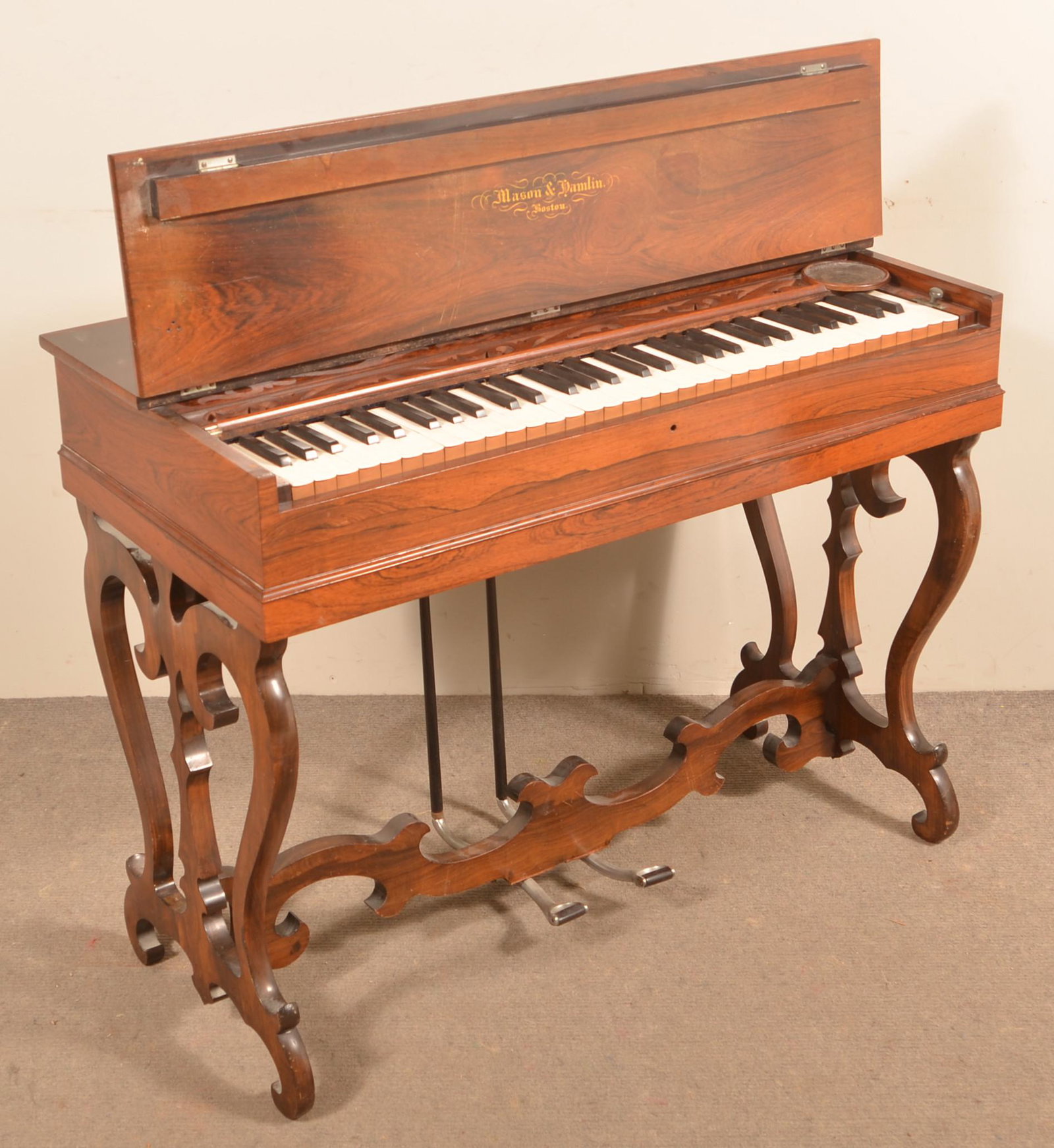 Mason and Hamlin Victorian Rosewood Melodeon.: Mason and Hamlin, Boston Victorian Rosewood Melodeon. 29-1/2"h. x 37-1/4"w. x 18-5/8"d. Condition: Good with wear.