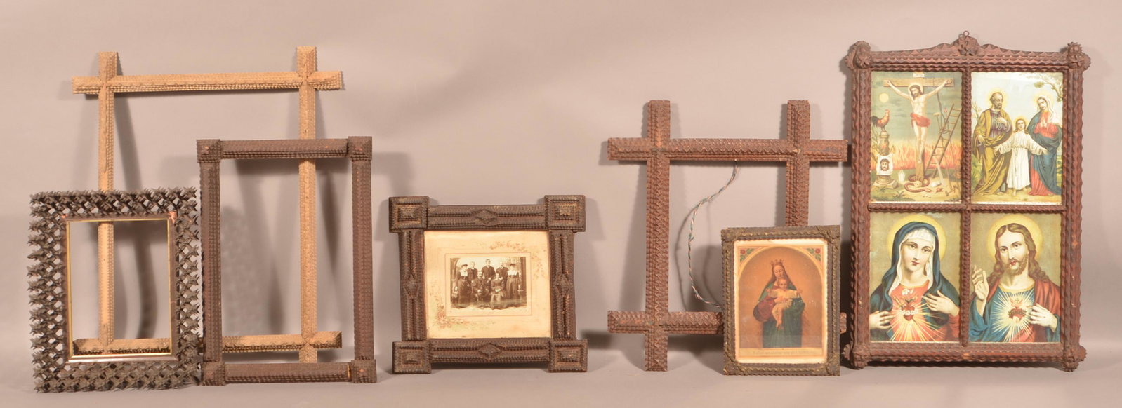 Seven Antique Tramp Art Picture Frames.: Seven Antique Tramp Art Picture Frames. Largest measures 20-1/5" x 25" overall. Condition: Good with wear and losses.