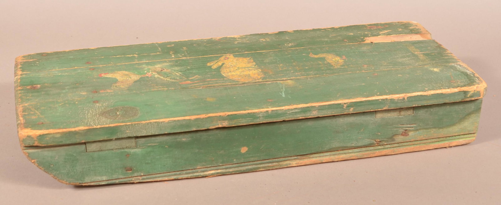 Primitive Folk Art Painted Wood Child's Sled.: Primitive Folk Art Painted Wood Child's Sled. Original green ground with chicken, rabbit and duck decoration. 26-1/2"l. Condition: Fair to good with wear and loss.