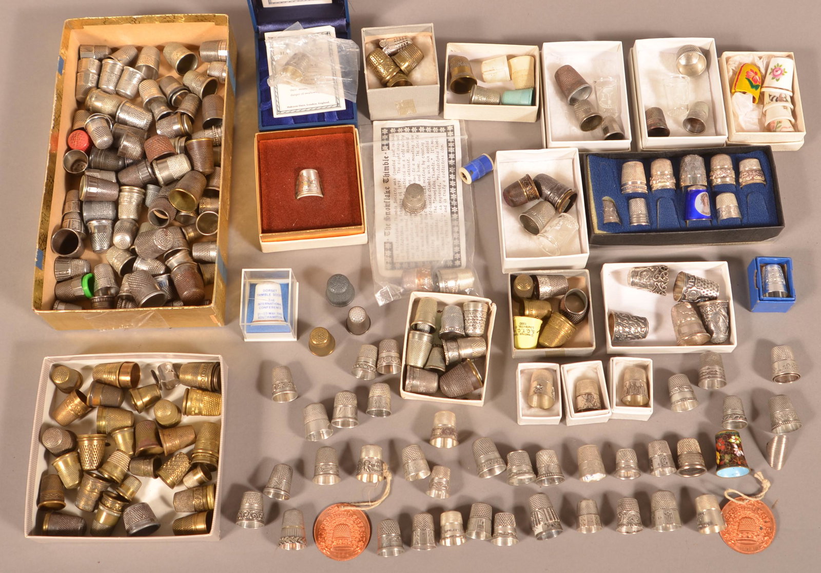 Collection of Antique and Vintage Sewing Thimbles.: Collection of Antique and Vintage Sewing Thimbles. Many are sterling silver. Tex Johnson Collection. Condition: Good with wear.
