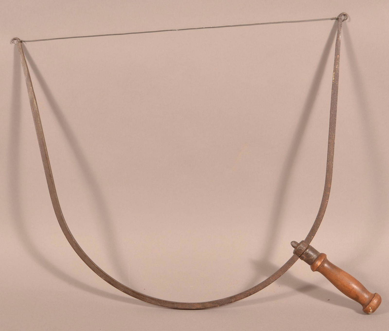 Antique/Vintage Wrought Iron Cheese Cutter.: Antique/Vintage Wrought Iron Cheese Cutter. Turned wood handle and wire cutter. 18"h. Condition: Good with minor rust and pitting.