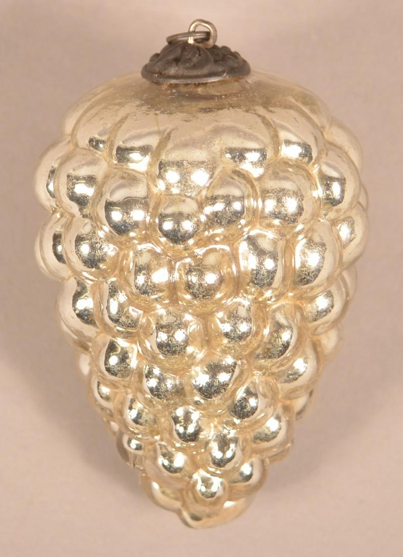 German Silver Glass Oval B Cluster of Grapes Kugel.: Antique German Amber Glass Oval B Form Cluster of Grapes Kugel. Baroque cap. 3-1/2"l. Condition: Very good.