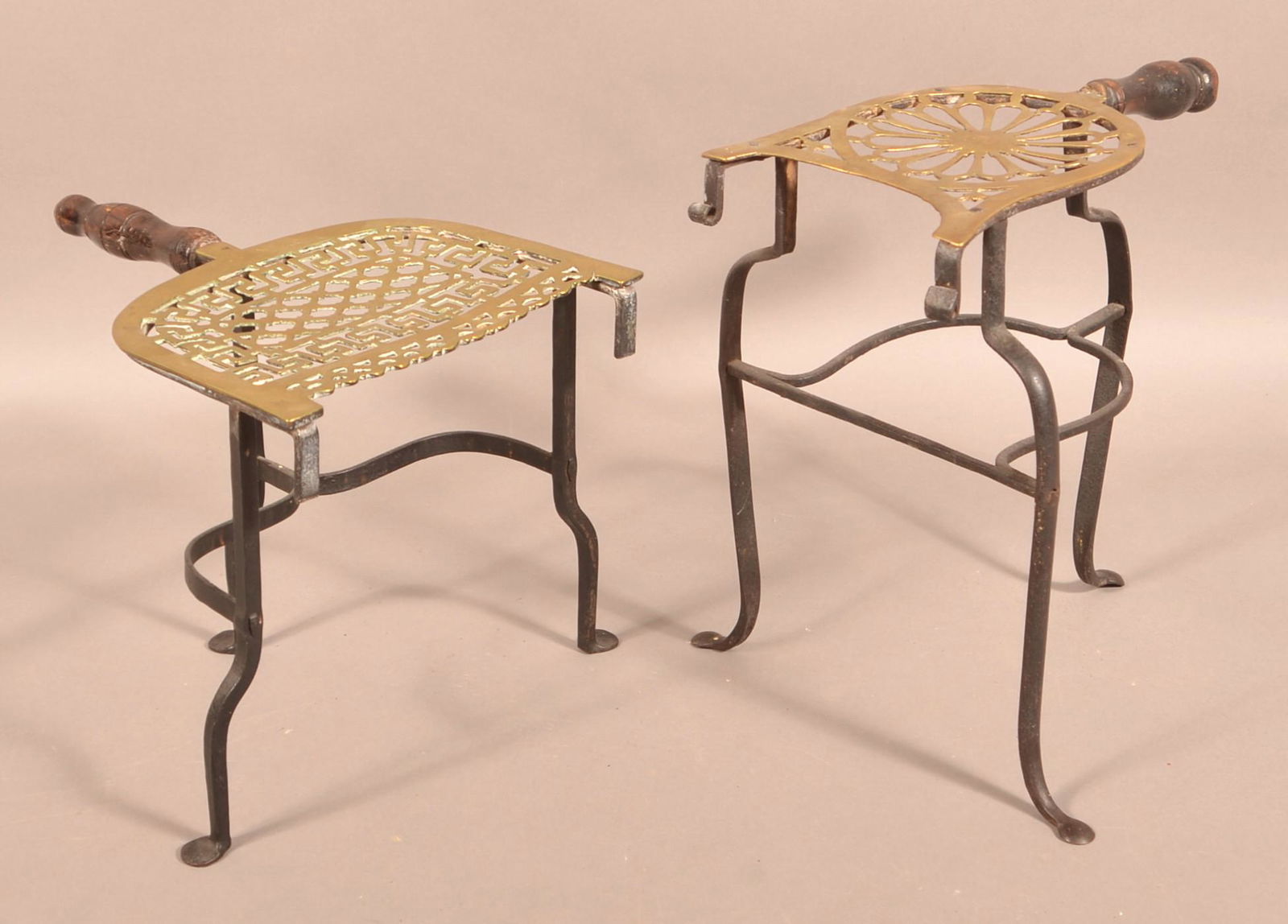 Pair of 19th Century Brass and Iron Hearth Trivets.: Pair of 19th Century Brass and Iron Hearth Trivets. Tallest measures 13"h. Tex Johnson Collection. Condition: Good with wear and some loss.