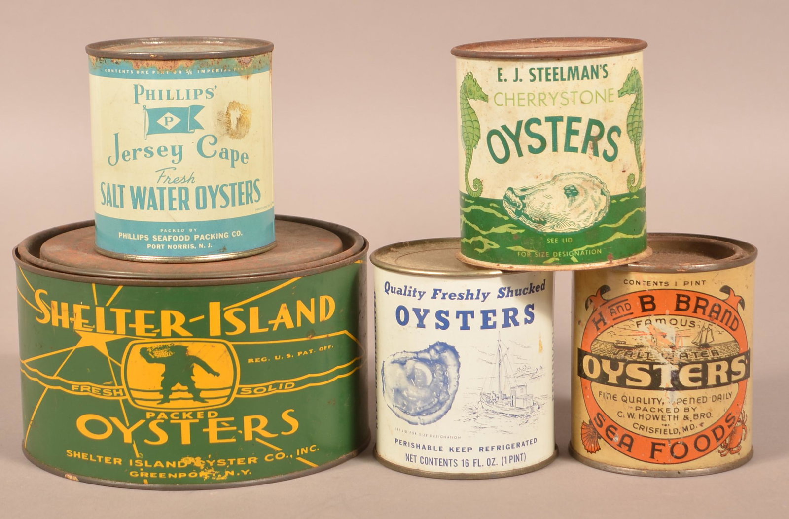Five Various Oyster Tins.: Five Various Oyster Tins. One half gallon and four pints. Condition: Good with minor dents and wear.
