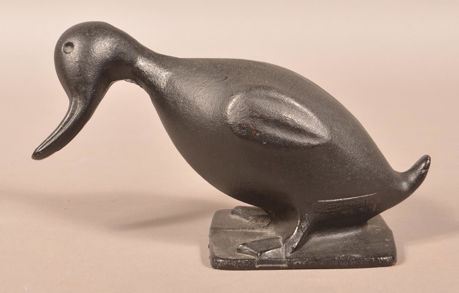 Vintage Virginia Metalcrafters Cast Iron Duck Doorstop.: Vintage Virginia Metalcrafters Cast Iron Duck Doorstop. Original black paint. 12-1/4"l. Condition: Very good.