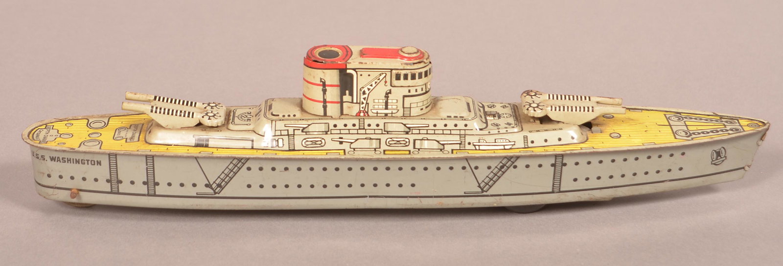 Marx Sparkling Warship USS Washington Tin Friction Toy.: Marx Sparkling Warship USS Washington Tin Litho Friction Toy. 14-3/4"l. Condition: Good with minor wear.