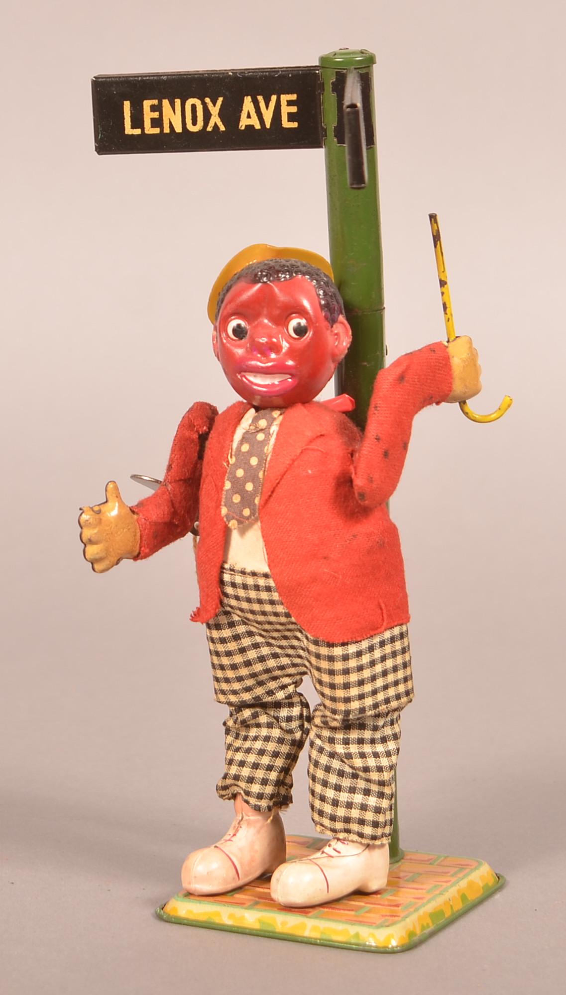 Black Americana Lenox Ave Wind-up Jigger Toy. (1 of 2)