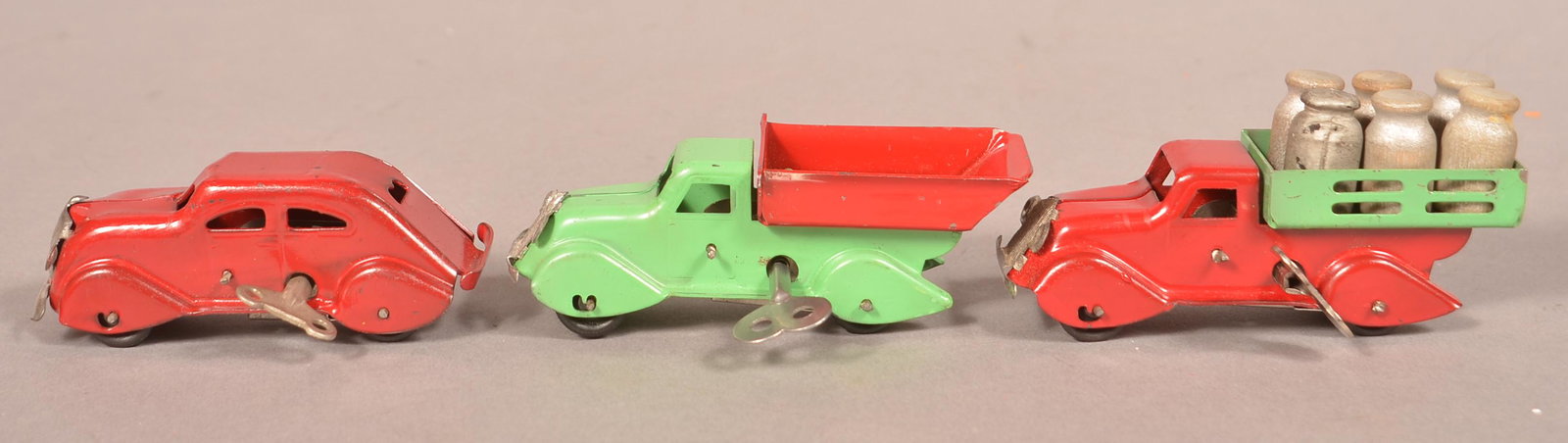 Three Small Wyandotte Wind-up Vehicles. (1 of 3)