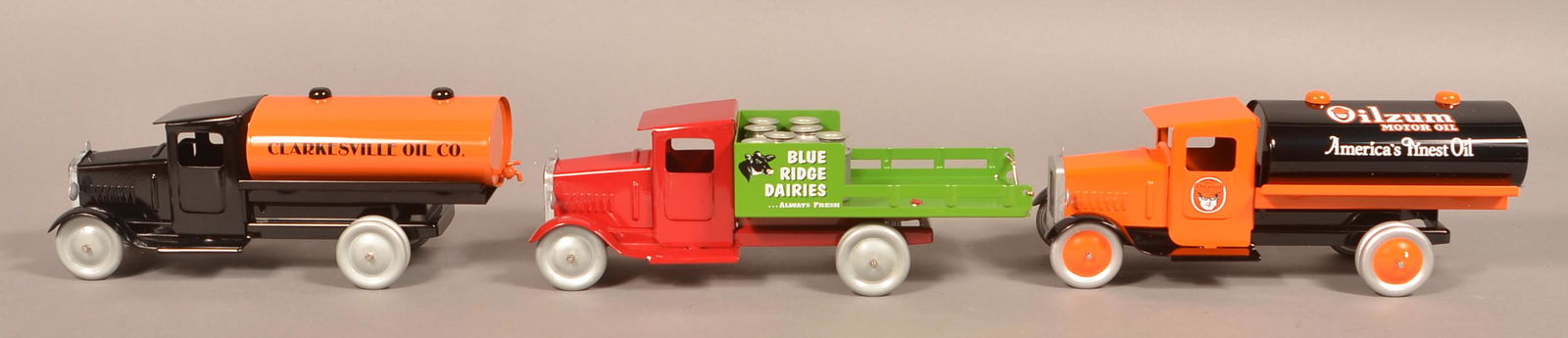 Three Reproduction Pressed Steel Delivery Trucks. (1 of 3)