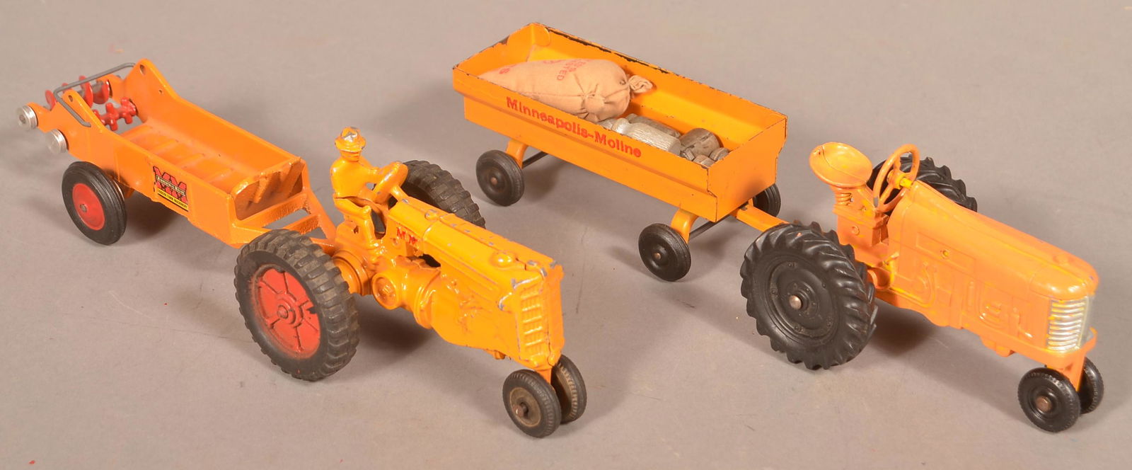 Vintage Cast Aluminum Minneapolis Moline Tractors. (1 of 3)