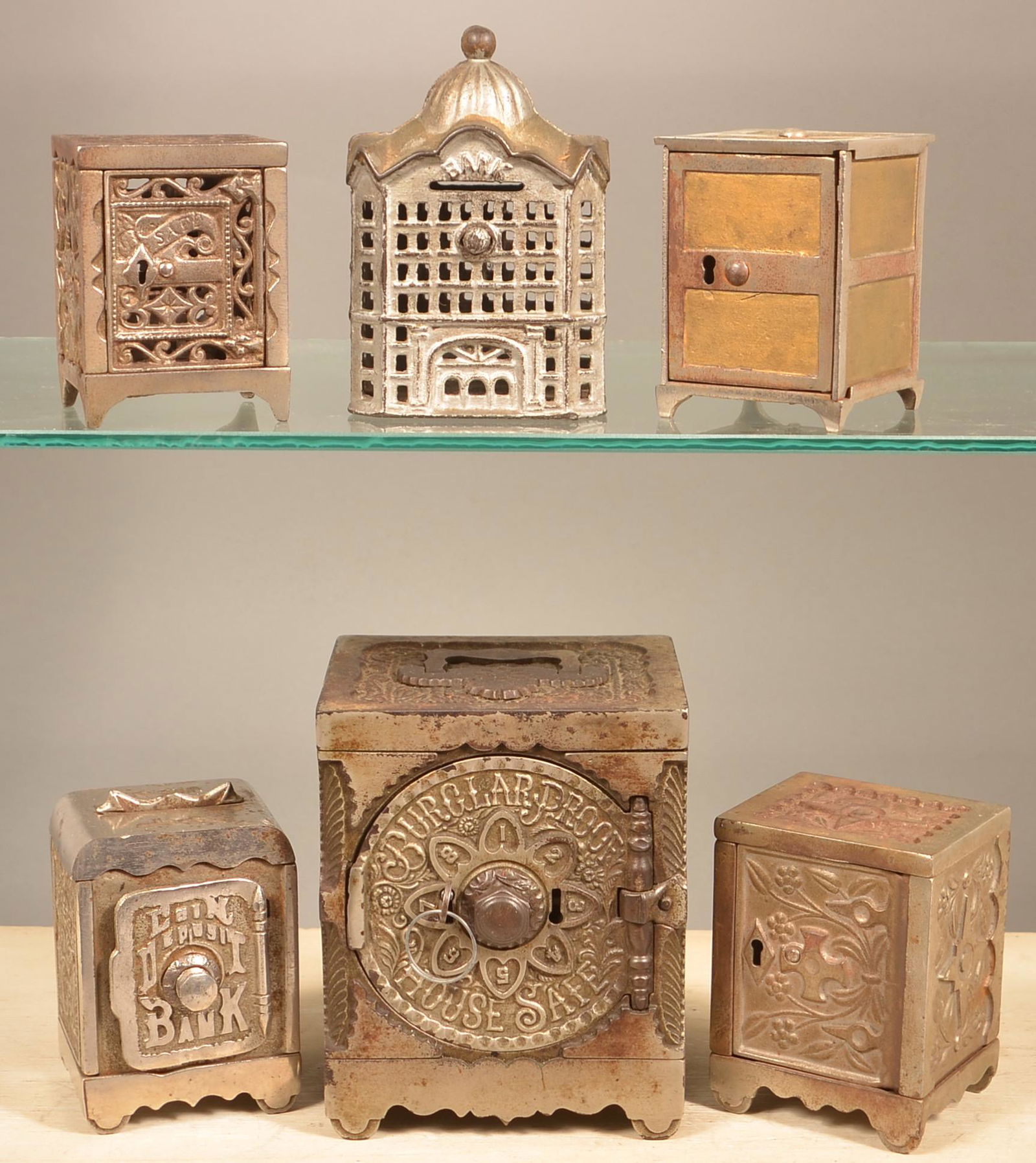 Six Antique Cast Iron Safe/Building Banks. (1 of 4)