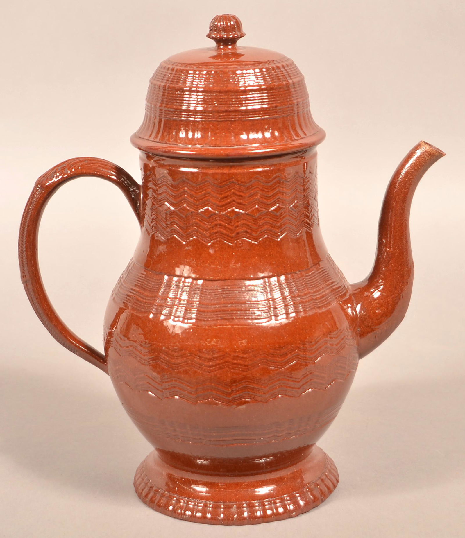 Redware Early 19th Century Dome Top Coffee Pot.: Redware Early 19th Century Dome Top Coffee Pot. Goose neck spout, baluster form with applied handle, tooled decoration on lid and body. 11-3/4"h. Condition: Very good with tiny chips.