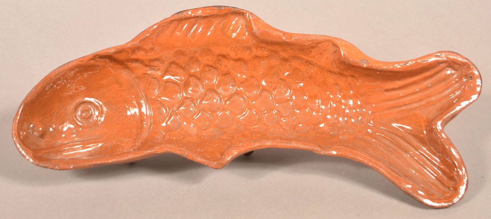 Large Antique Glazed Redware Fish Form Mold.: Large Antique Glazed Redware Fish Form Mold. 17-1/2"l. Condition: Very good with minor chips.