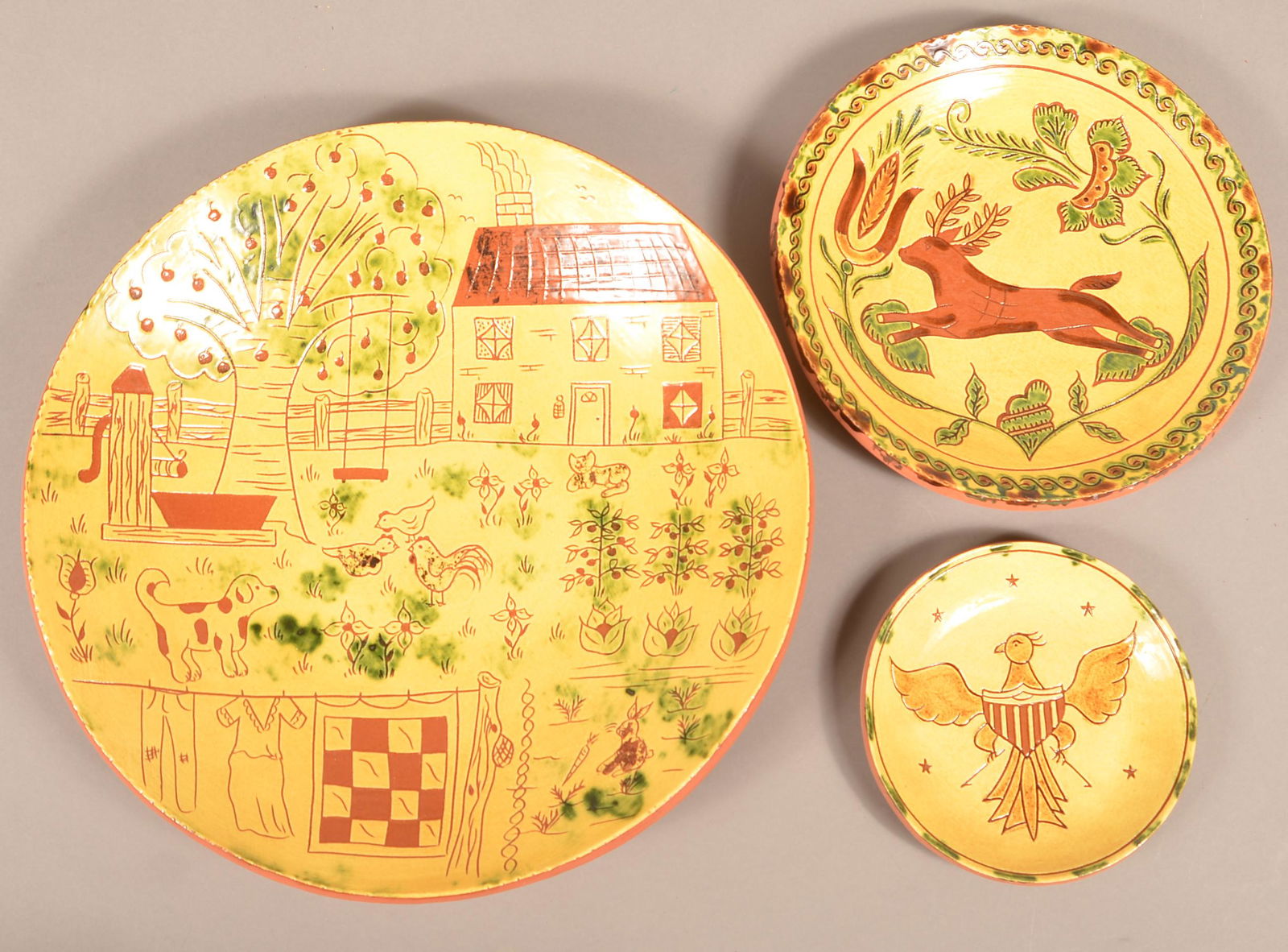 Breininger Redware Sgrafitto Charger and Two Plates.: Breininger Redware Sgrafitto Charger and Two Plates. Charger measures 15-3/4" diam. Condition: Very good.