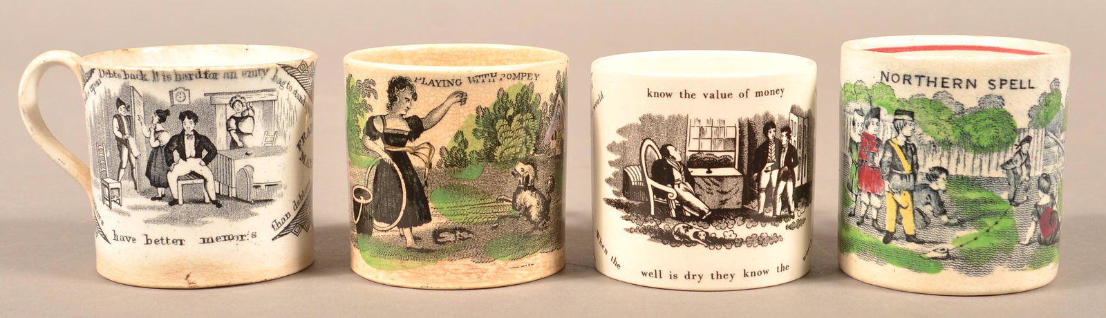 Four Transfer Decorated Ironstone China Child's Mugs.: Four Transfer Decorated Ironstone China Child's Mugs. 2-3/4"h. Condition: Good with minor wear.