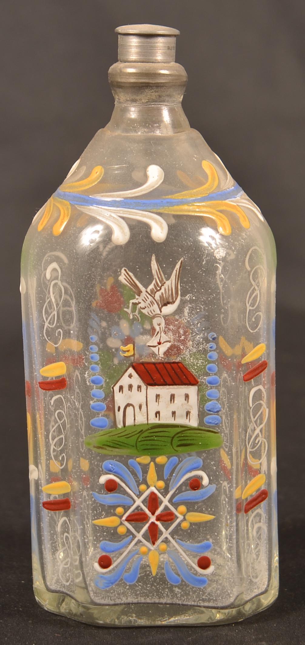 Stiegel Type Enamel Decorated Glass Cologne Bottle.: Stiegel Type Polychrome Enamel Decorated Colorless Glass Cologne Bottle. Bird, building, floral and foliate decoration. 5-1/2"h. Condition: Very good.