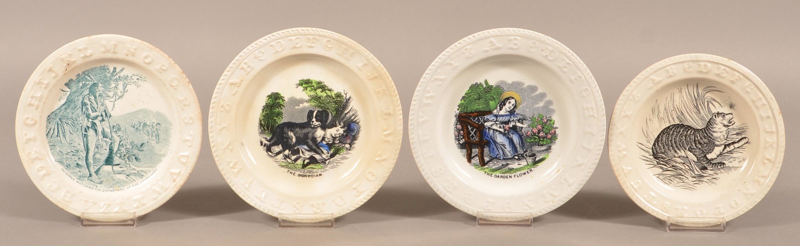 4 Decorated Ironstone China Child's Alphabet Plates.: Four Transfer Decorated Ironstone China Child's Alphabet Plates. Largest 7" diam. Condition: Good with minor wear.