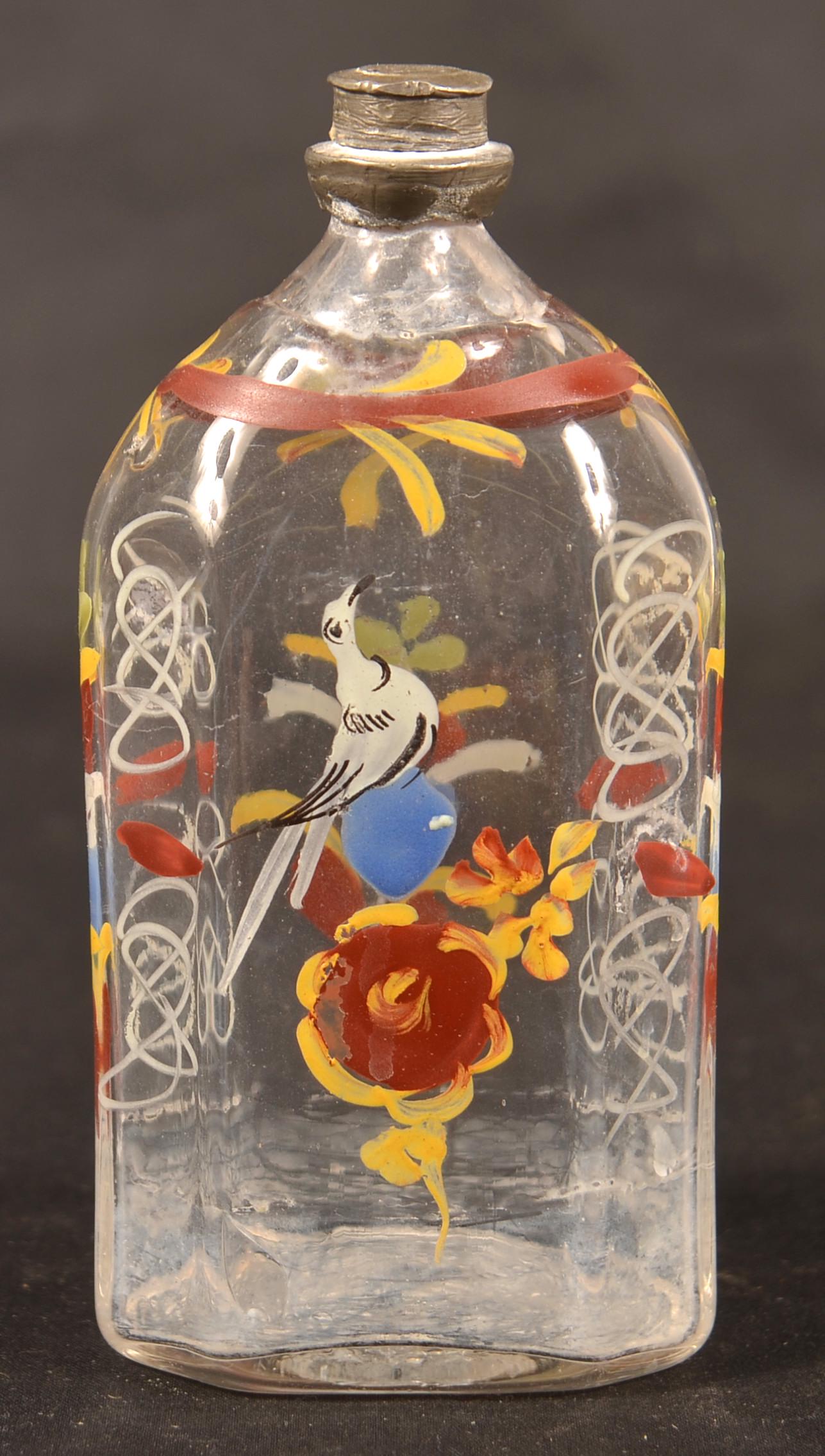 Stiegel Type Enamel Decorated Glass Cologne Bottle.: Stiegel Type Polychrome Enamel Decorated Colorless Glass Cologne Bottle. Bird, floral and foliate decoration. 4-3/4"h. Condition: Good with minor wear.