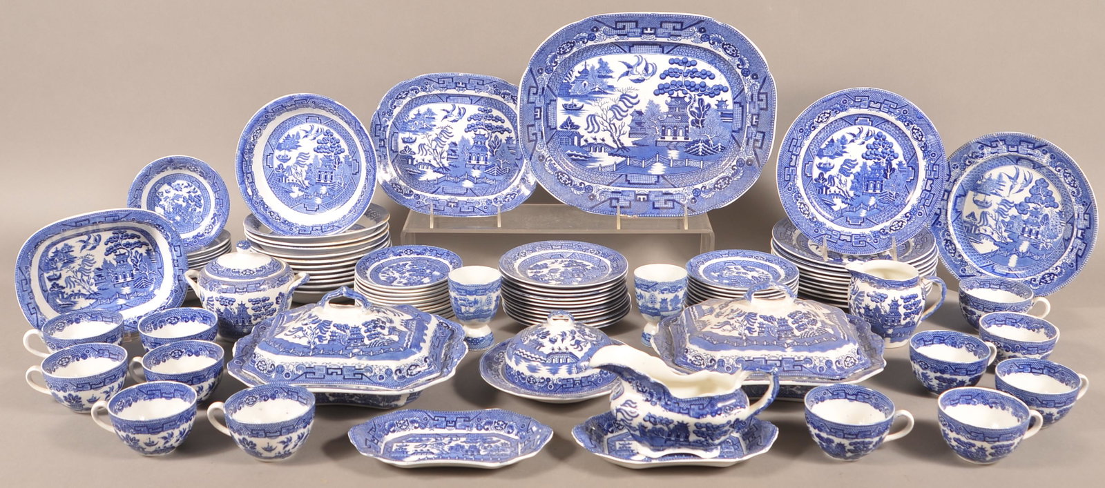97 Pieces of Blue Willow Pattern China.: 97 Pieces of Blue Willow Pattern China. Allertons, England. Platter 14"l. Condition: Good with minor wear.
