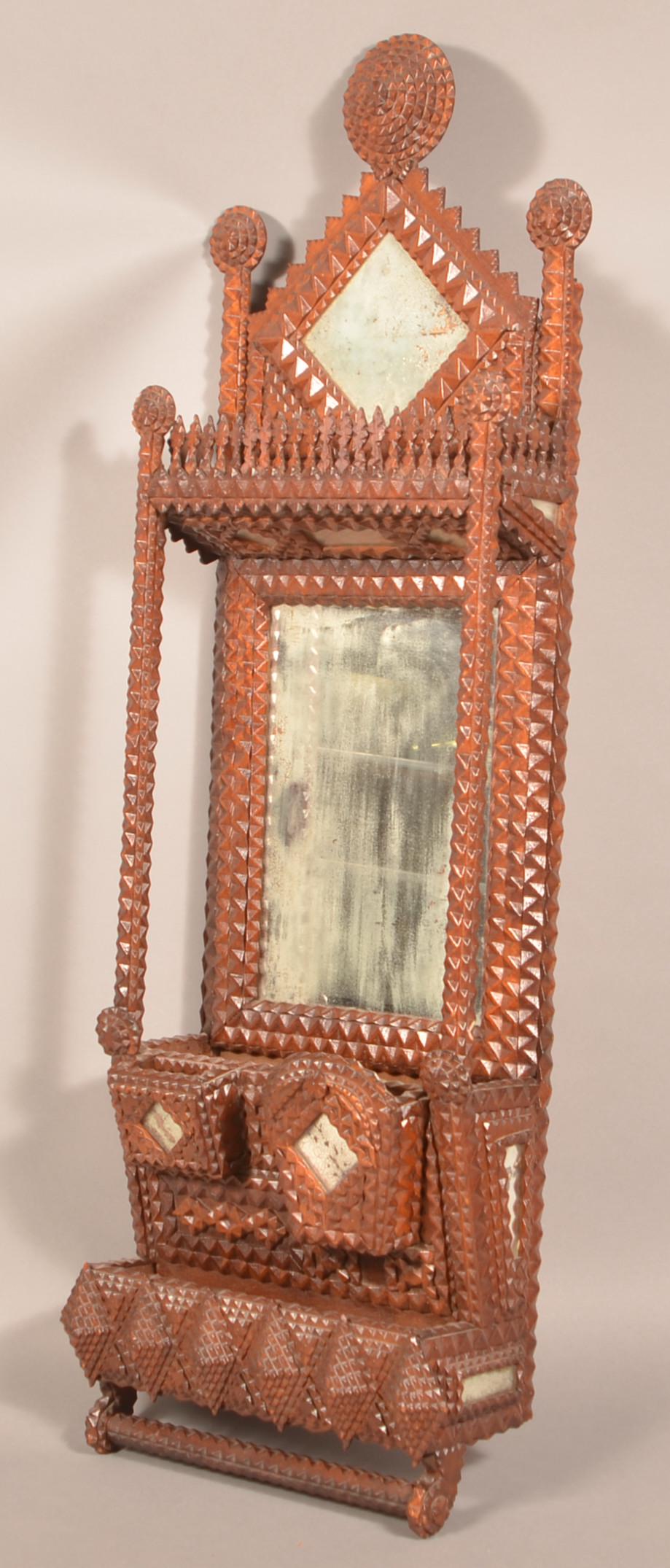 19th Century Tramp Art Mirror-Back Wall Box.: 19th Century Tramp Art Mirror-Back Wall Box. Having a lift-out towel bar and pocket compartments. 48"h. x 16"w. x 7"d. Condition: Good with minor wear.