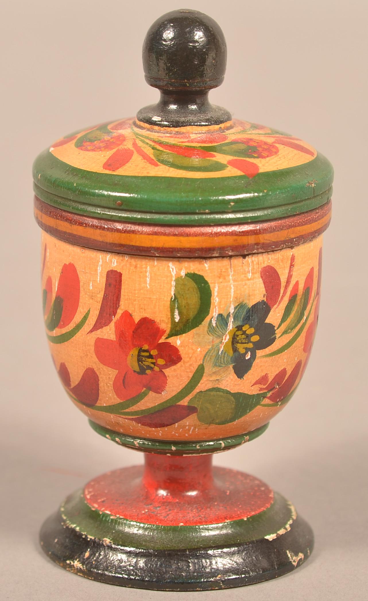 Covered Lehnware Footed Saffron Cup.: Covered Lehnware Footed Saffron Cup. Joseph Long Lehn (1798-1892), Clay Township, Lancaster County, Pennsylvania. Turned poplar wood, acorn finial lid, round footed base, polychrome painted with tan g