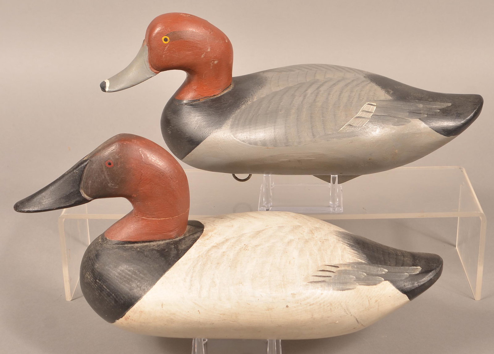 R. Madison Mitchell 1948 and 1975 Decoys.: R. Madison Mitchell 1948 and 1975 Decoys. Largest 15"l. Condition: Good, one with a repair to neck.
