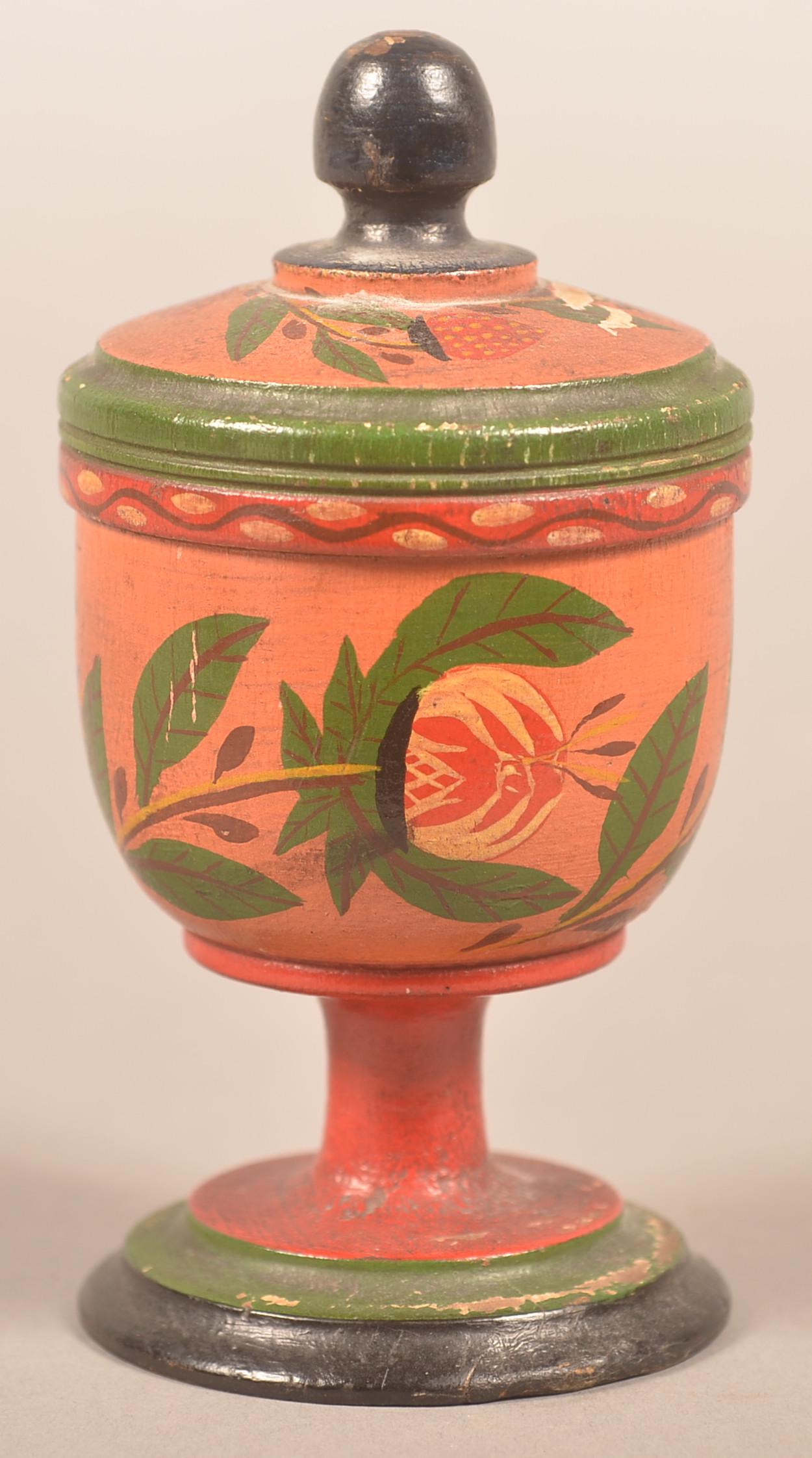 Turned and Painted Poplar Covered Saffron Cup.: Turned and Painted Poplar Covered Saffron Cup. Attributed to Joseph Lehn, Clay Township, Lancaster County, PA. 1798-1892. Polychrome painted on salmon ground with strawberry, bud and foliate motif on 