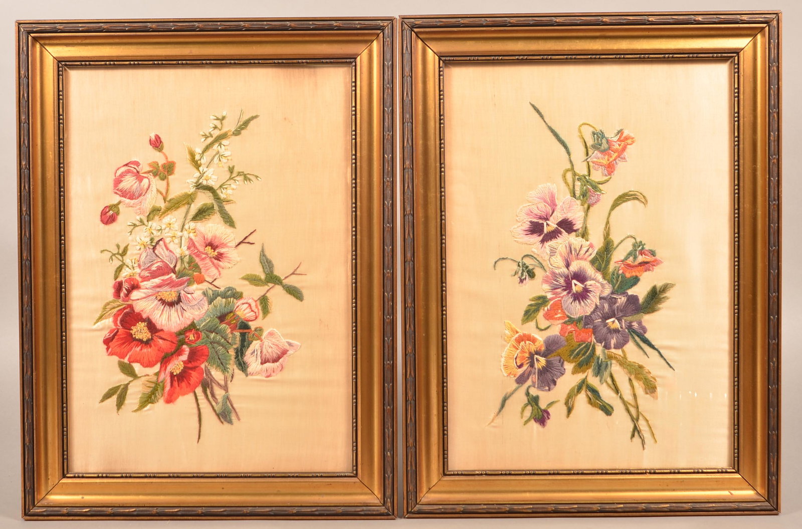 Pair of Antique Embroidered Silk Panels.: Pair of Antique Embroidered Silk Panels. Each depicting a bouquet of flowers. Sight size: 18-1/2” x 13”. In matching period gold frames, 22-1/2” x 17” overall. Condition: Good.
