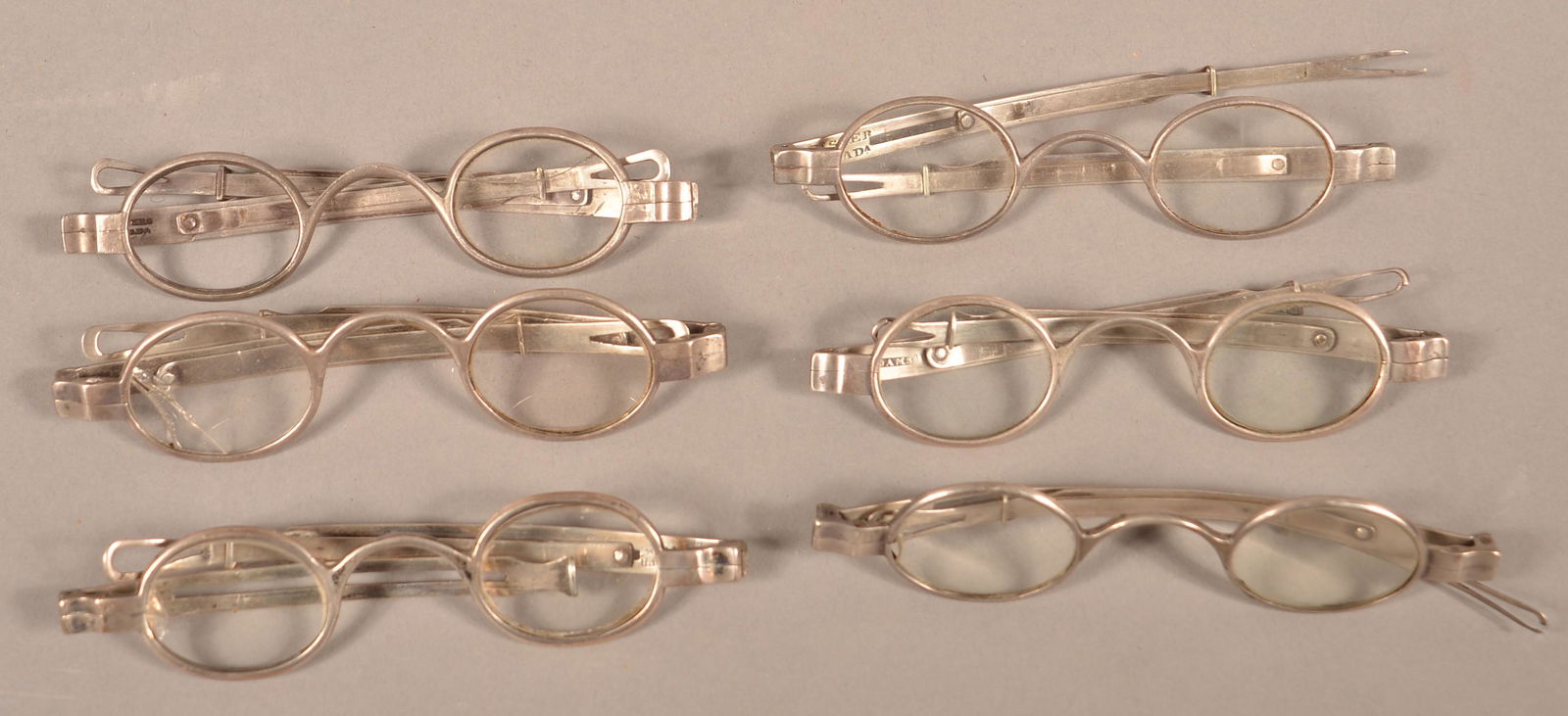 Six Pairs of 19th Century Coin Silver Frame Eye: Six Pairs of 19th Century Coin Silver Frame Eye Glasses. C. Smith, C, Fisher, (Philadelphia), J. Peters, (Philadelphia), J. Chandler (New York), H. Adams (New York) and H & H, (Albany, NY). Condition: