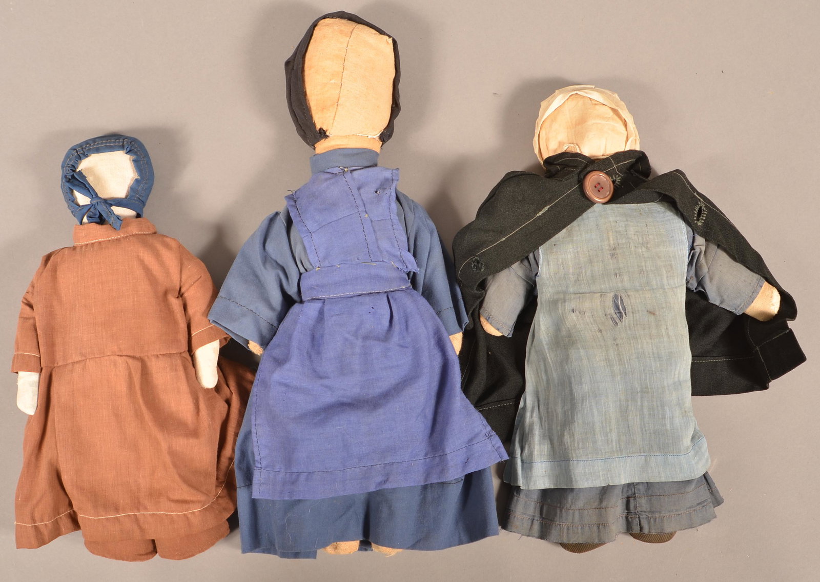 Three Vintage Amish Cloth Dolls in Traditional Dress.: Three Vintage Amish Cloth Dolls in Traditional Dress. Tallest 17''h. Condition: Good with wear.