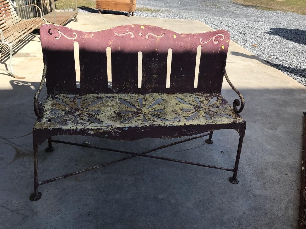 Metal & Tin Painted Garden Bench: with cutout design seat. 46 1/2"W x 15"D x 18"H (seat height) Condition: Good with minor separations and pitting.