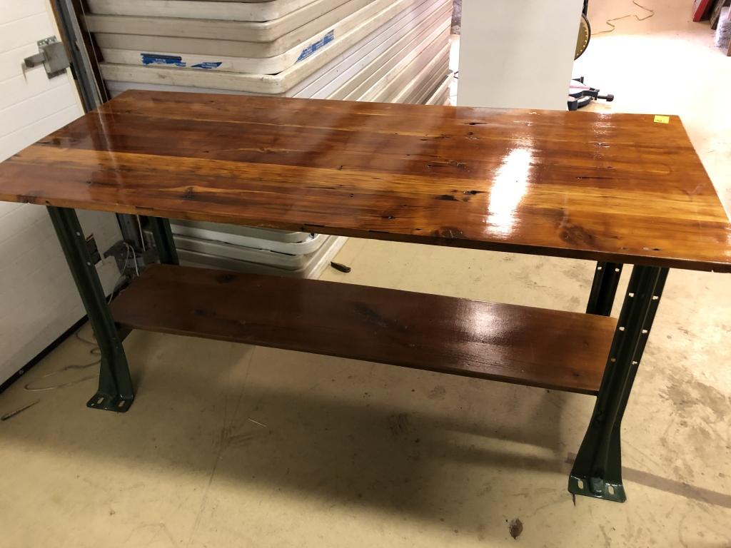 Very Good Work Table: w/ pine finished top and lower shelf and powder coated green metal base. 69"L x 30 1/2" W x 32"H. Condition: Very Good.