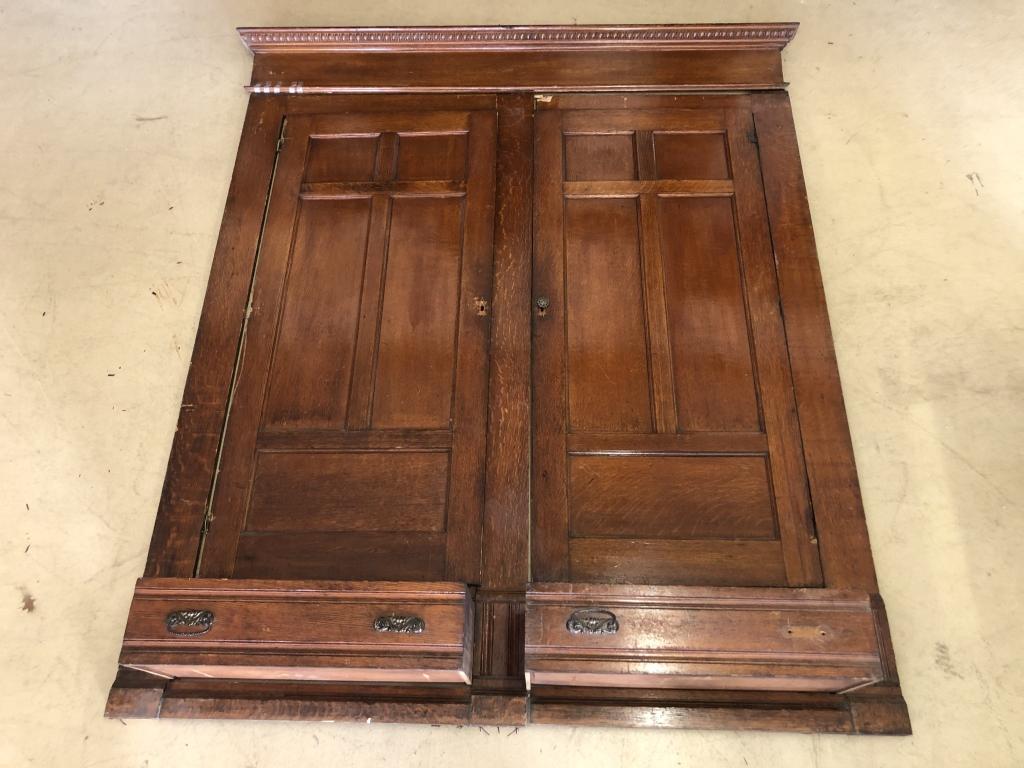 Quarter Sawn Oak Built-in Wardrobe Frame: w/ 2 - five paneled doors and 2 lower drawers and bold cornice. 78"W x 95 1/4"H. Condition: Good, minor chip out of frame, missing some hardware.
