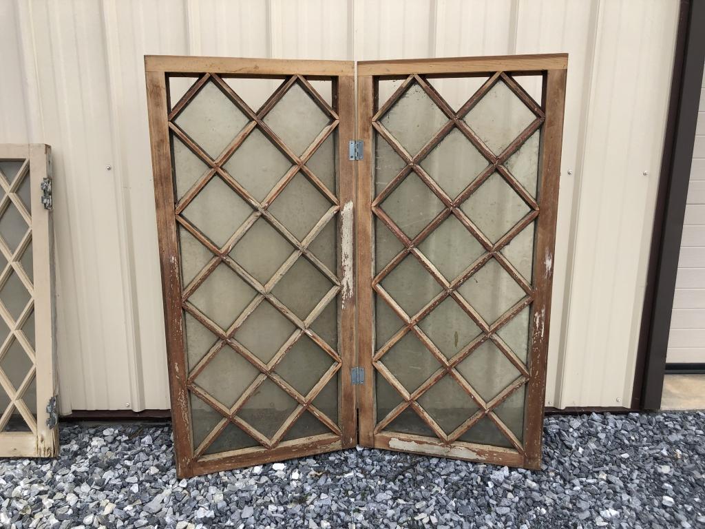 Bifold Diamond Pattern Window Screen: Each pane measures 20 5/8"W x 43 7/8"H x 1 3/4"D. Condition: Missing minor glass.