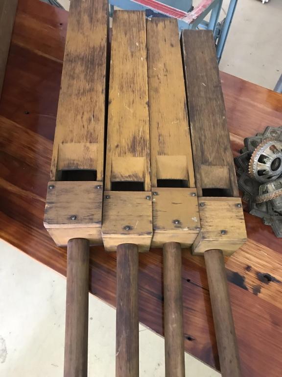 4-1890’s Graduated Pine Wooden Organ Flutes: with iron hooks. Longest-48”. Condition: very good