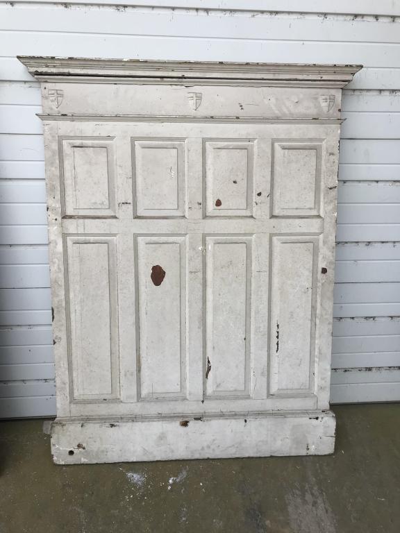 Oak Quarter Sawn Raised Panel: with cornice molding and religious shield. W-43-1/2”H-60-1/4”. Condition:Painted white over stain finish.