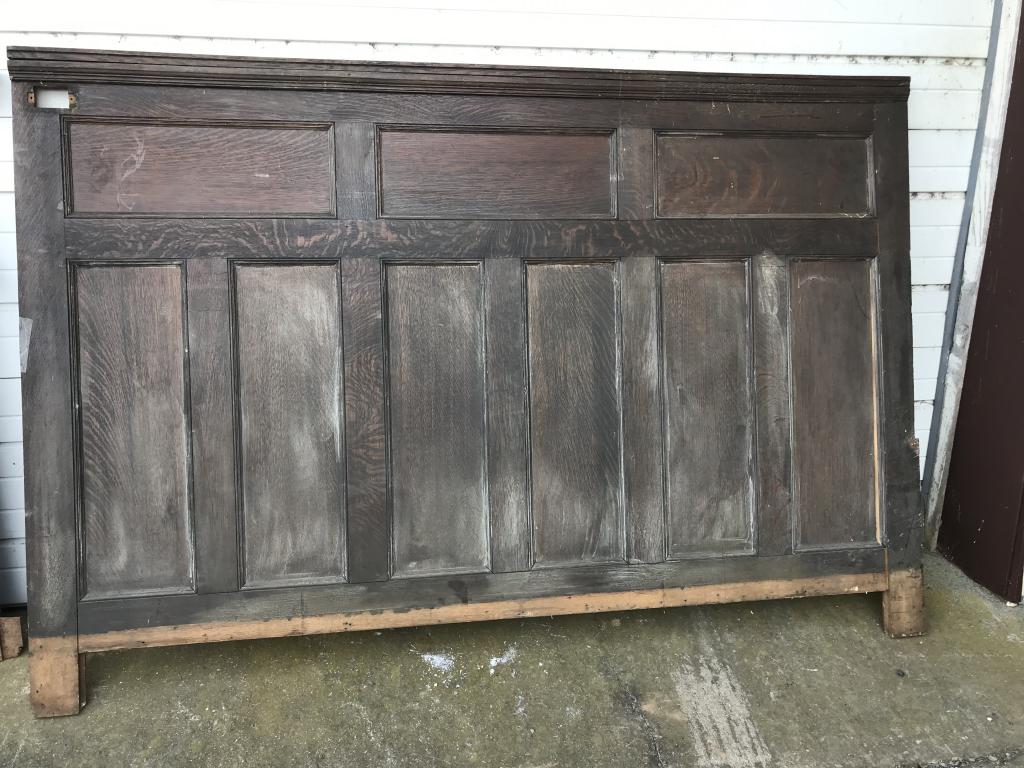 Oak Quarter Sawn Panel : with cornice molding. W-85-3/4” H-57-3/4. Condition: Good, missing bottom trim, electrical outlet on top molding.