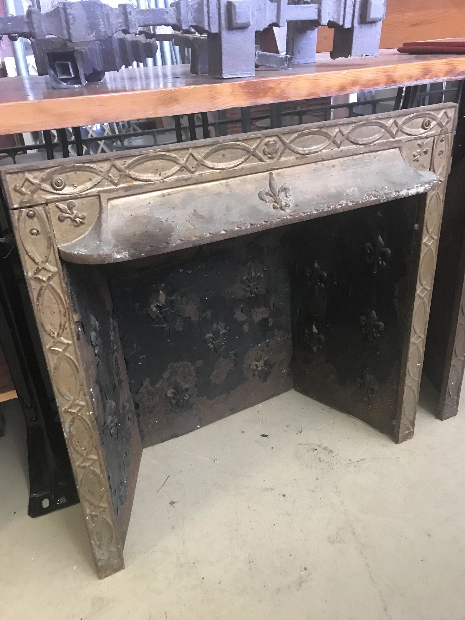 Good Vintage Metal And Tin Fire Place Embossed: W-30-1/4”H-30”D-15” Condition: Good with minor losses