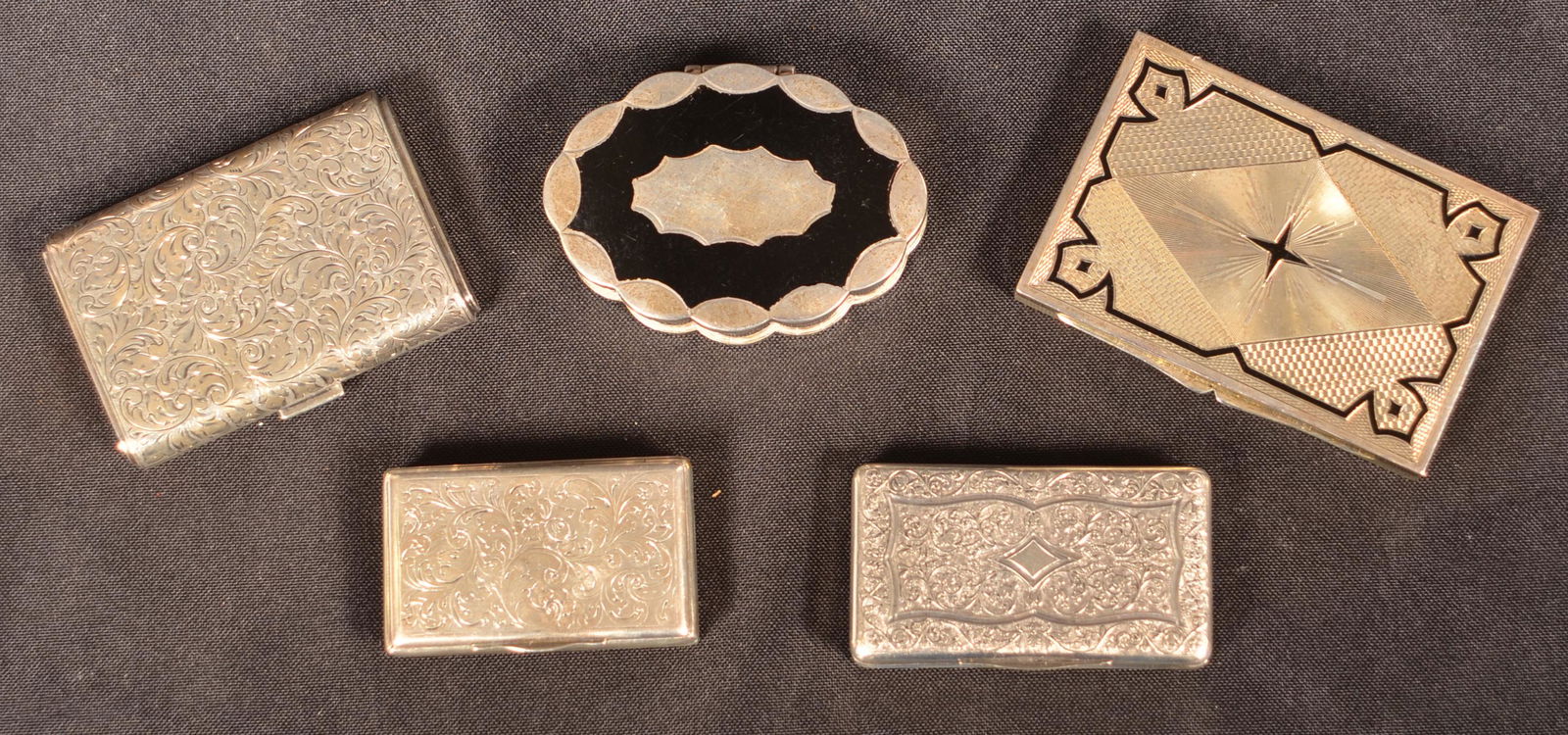 5 Antique/Vintage Sterling Cigarette Cases & Compacts.: Five Antique/Vintage Sterling Cigarette Cases and Compacts. Largest 3-5/8"w. 12.7 ozt approximate. Condition: Very good with some use wear.