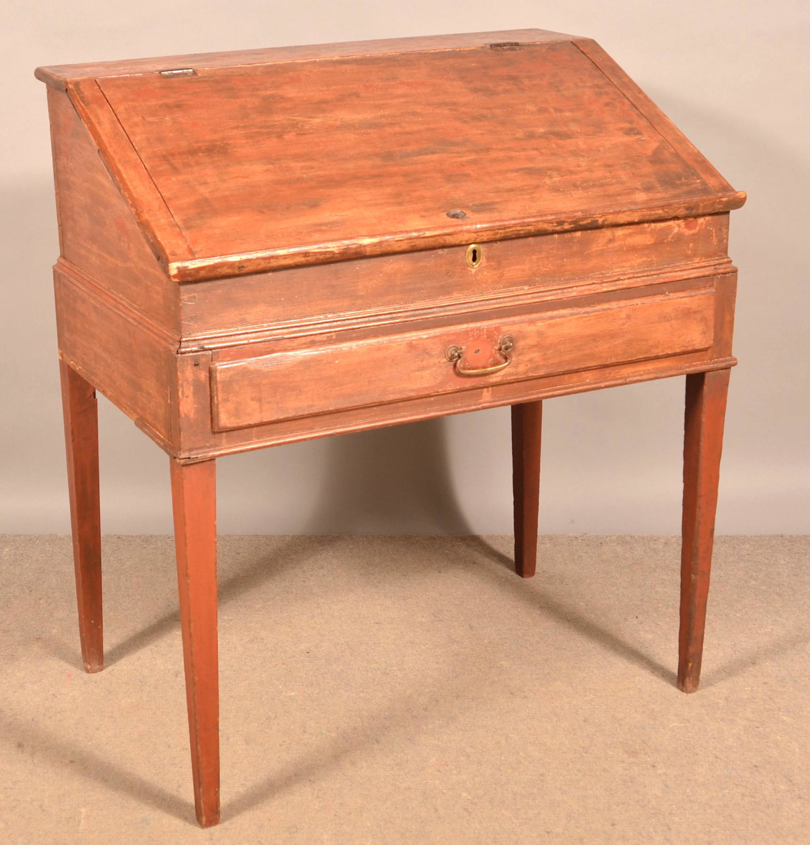 PA Hepplewhite Softwood Schoolmaster's Desk.: PA Hepplewhite Softwood Schoolmaster's Desk. Slat-lid with interior compartments, full-width dovetailed drawer and tapered legs. Remnants of old red paint. Eugene and the late Vera Charles, Lancaster,