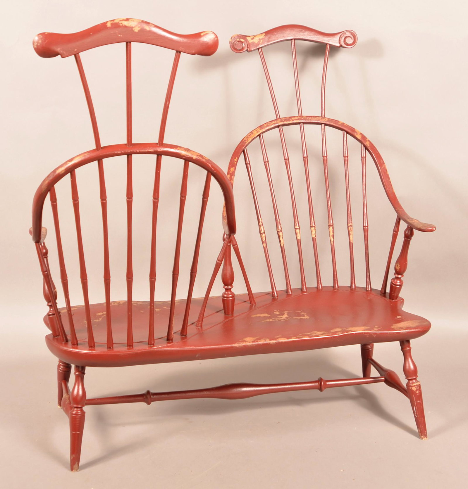 W. Wallick Child's Windsor Style Comb-Back Tete-A-Tete.: Contemporary W. Wallick (Wrightsville, PA.) Child's Windsor Style Comb-Back Tete-A-Tete. Original maroon paint. Seat height 10-1/2", 35-1/4"h. overall. Condition: Good with intentional wear.