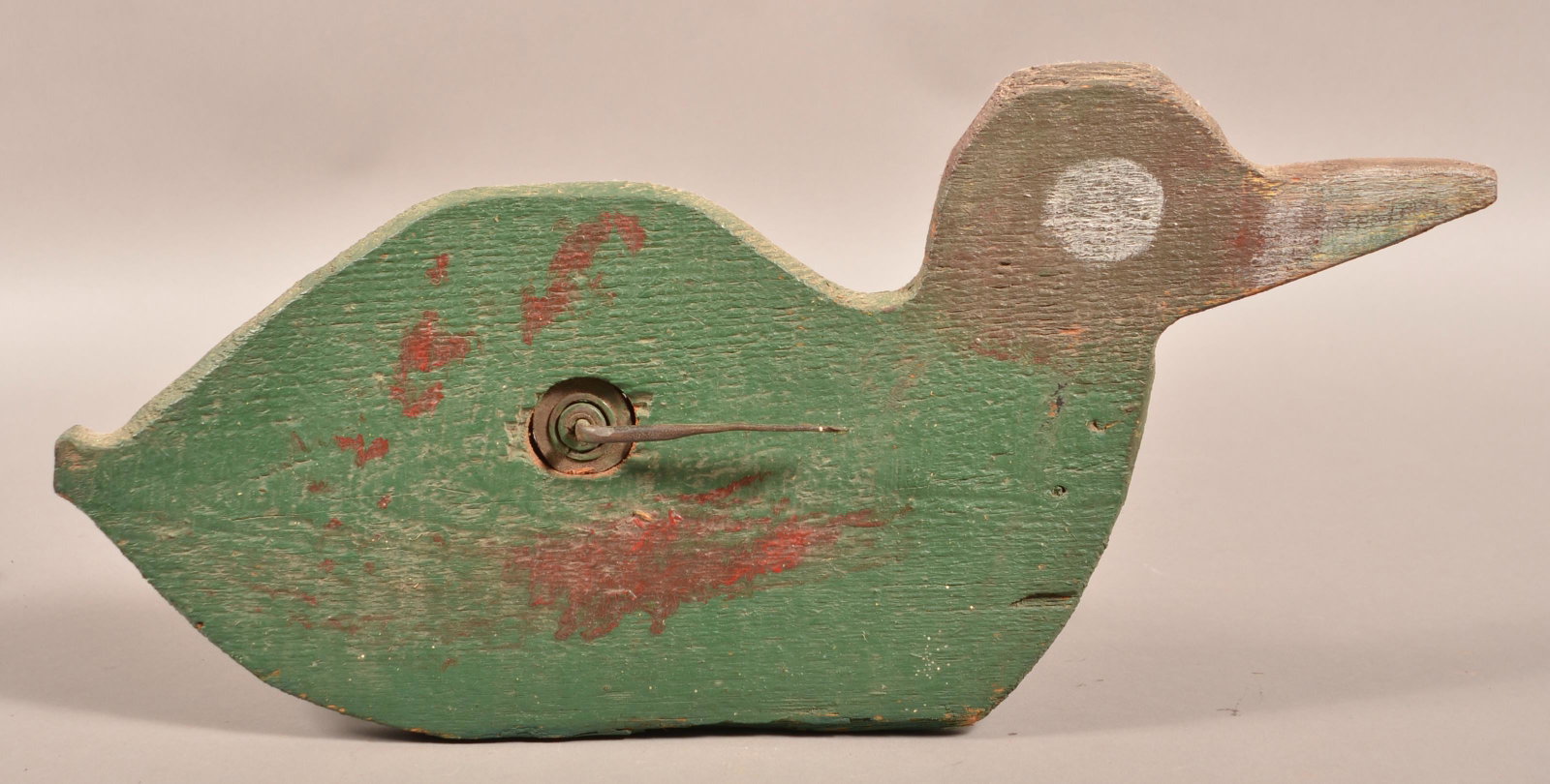 Primitive Painted Wood Duck Form Whirligig.: Primitive Painted Wood Duck Form Whirligig. 10-1/2"h. x 22-1/2"w. Condition: Good with wear.