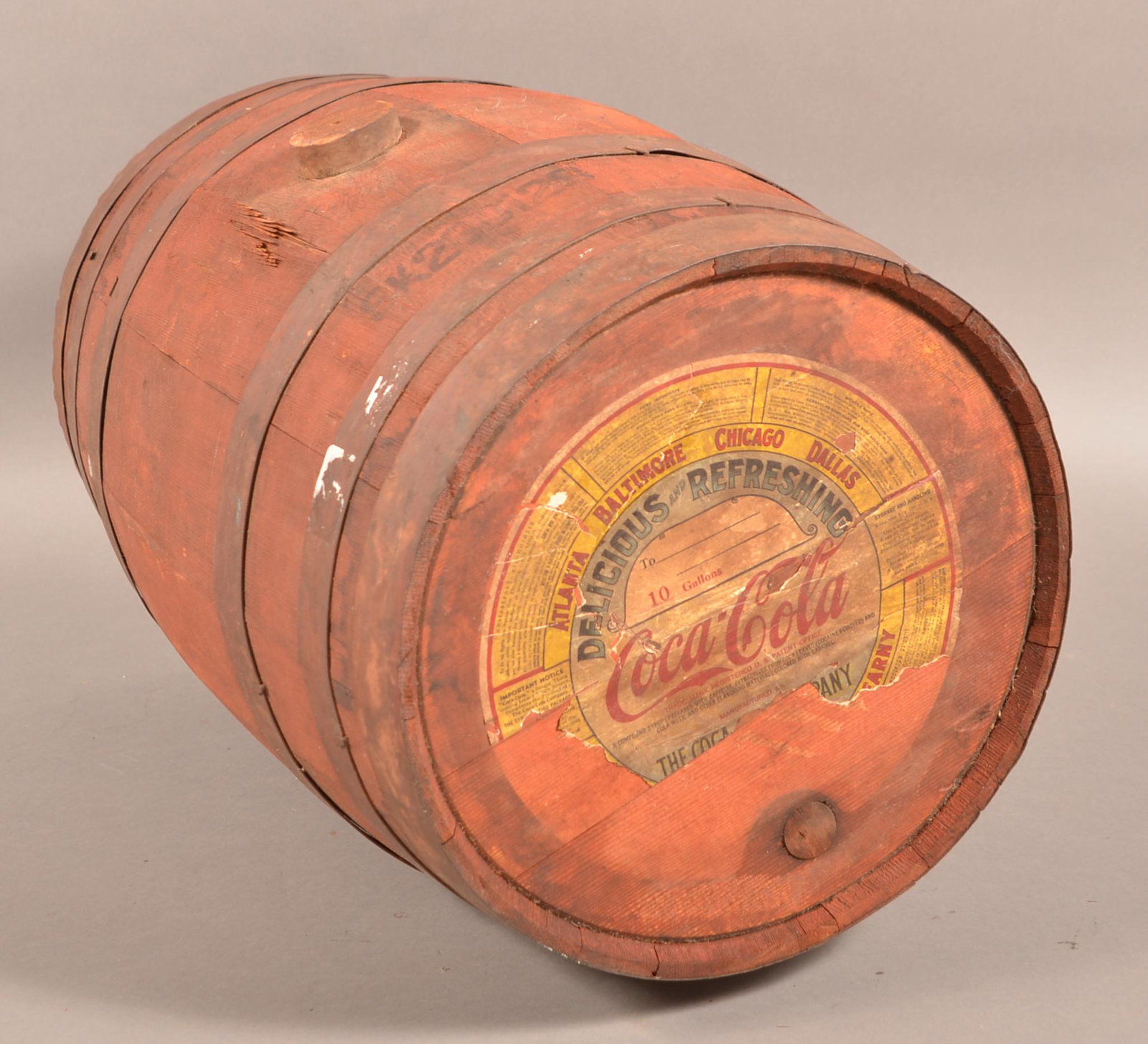 Vintage Coca-Cola Syrup 10 Gallon Wooden Barrel.: Vintage Coca-Cola Syrup 10 Gallon Wooden Barrel. 21"h. Condition: Barrel is good with wear, paper label has loss and tears.