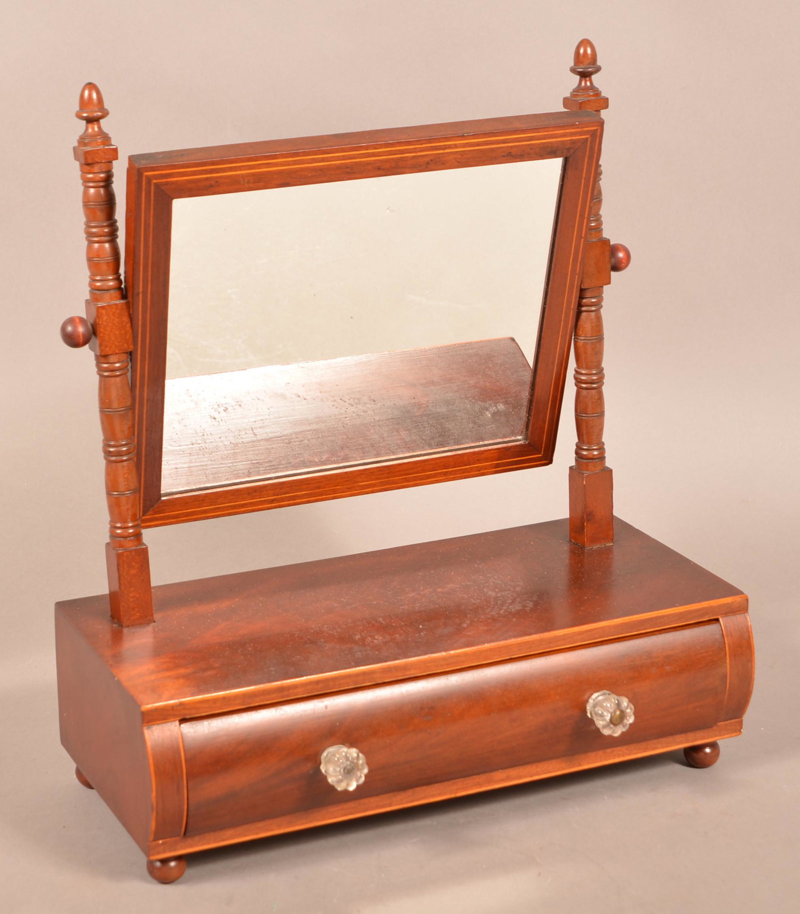 Federal Mahogany Line Inlaid Shaving Stand.: Federal Mahogany Line Inlaid Shaving Stand. Turned mirror supports, convex dovetailed drawer and ball tuned feet. 18"h. x 16"w. x 8"d. Condition: Good with wear and minor loss.