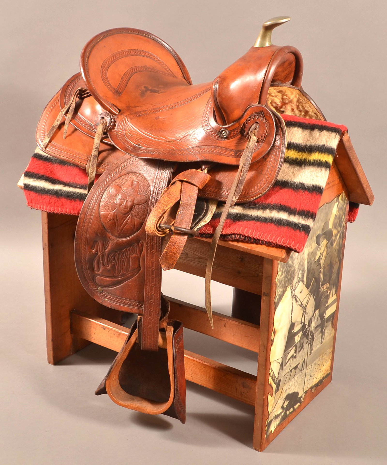 Vintage Hopalong Cassidy Leather Child's Saddle.: Vintage Hopalong Cassidy Tooled Leather Western Child's Saddle. 12" seat. With stand. Condition: Good with wear.