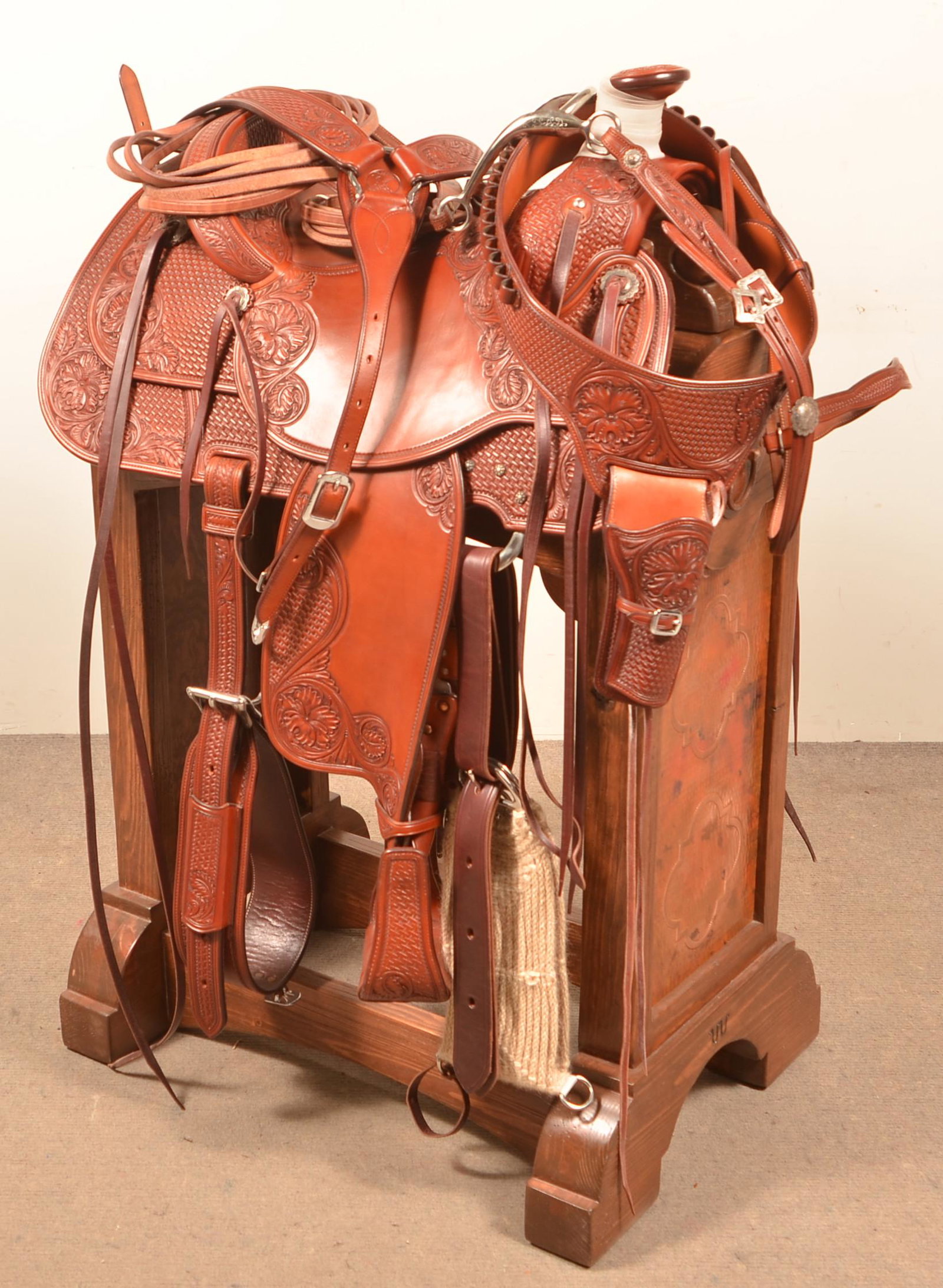 Seidel's Saddlery Tooled Leather Western Saddle.: Seidel's Saddlery Tooled Leather Western Saddle. Made in Cody, WY. With accessories and stand. Condition: Very good.