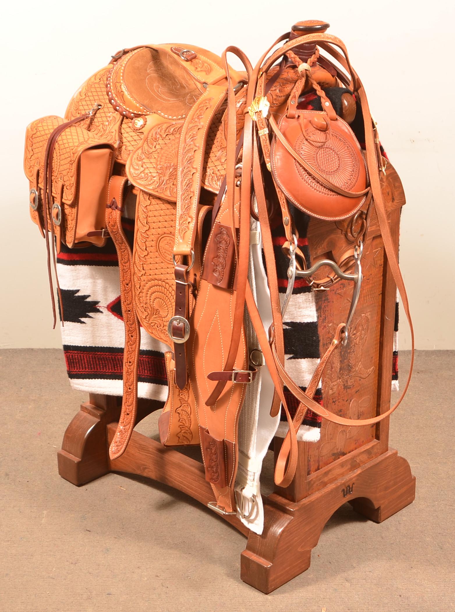 Harry Thurston's Tooled Leather Western Saddle.: Harry Thurston's Tooled Leather Western Saddle. Made in Phoenix, AZ. With accessories and stand. Condition: Very good.
