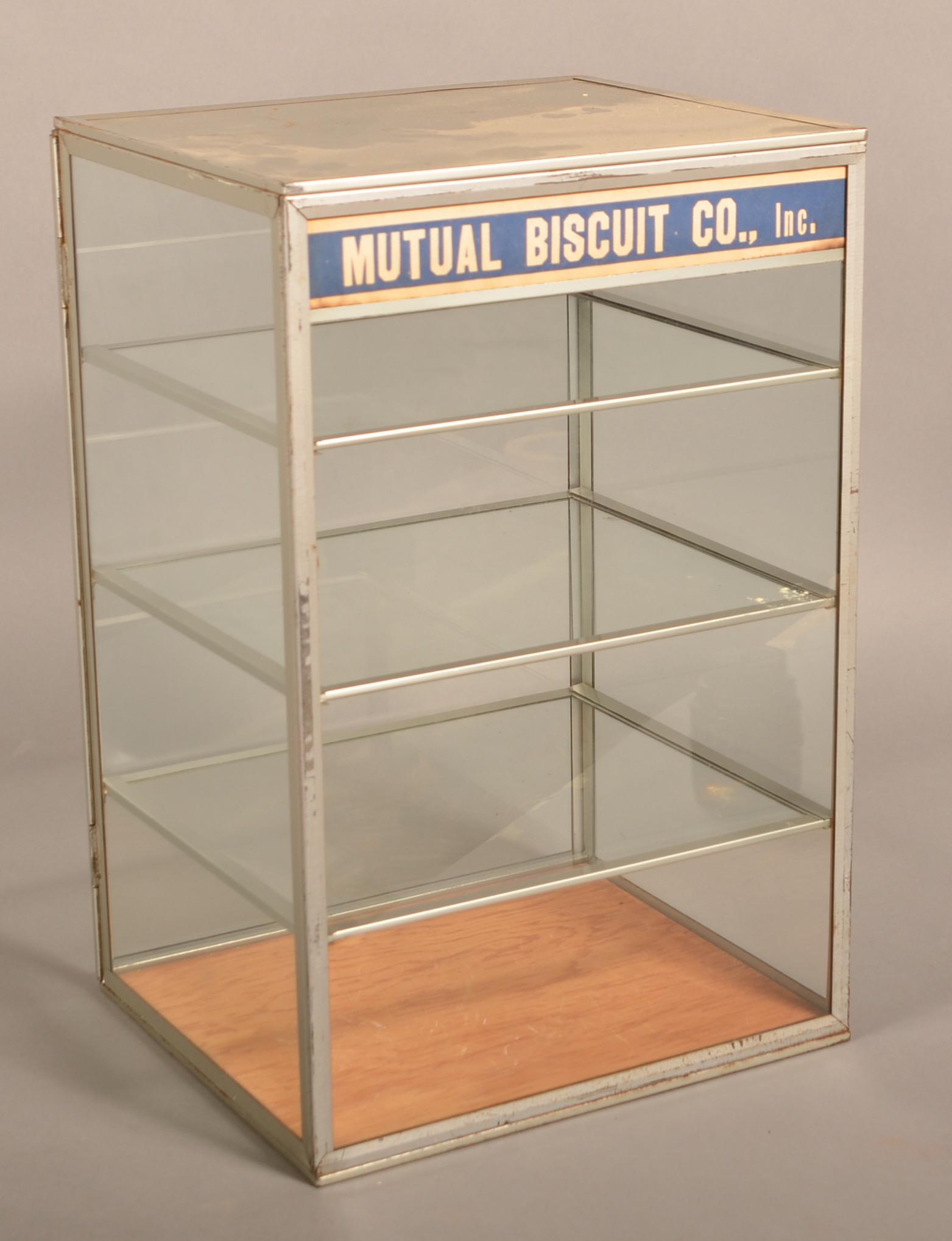 Mutual Biscuit Co. Country Store Display Case.: Mutual Biscuit Co. Country Store Display Case. 18-5/8"h. x 12"w. x 10-3/4"d. Condition: Good with minor wear.