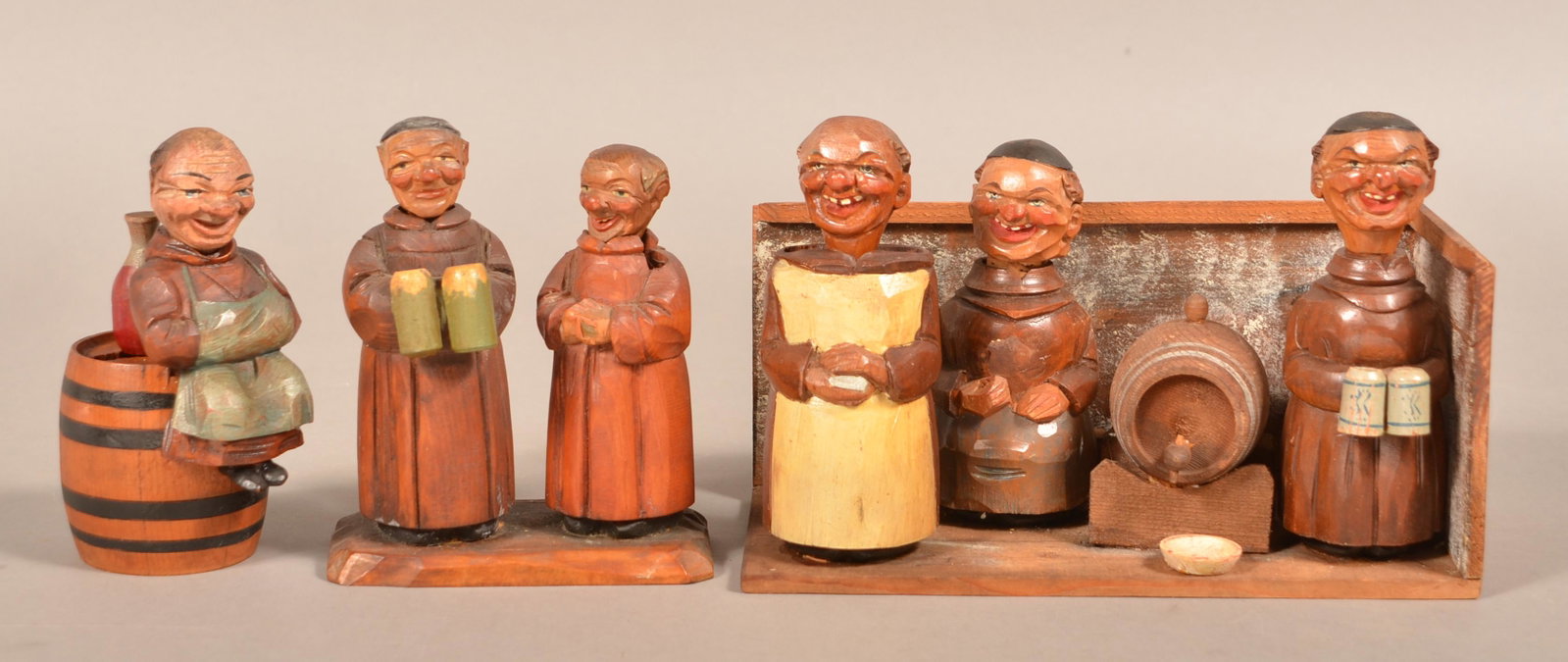 Three Anri Italian Hand-Carved Wood Monk Bar Sets.: Three Anri Italian Hand-Carved Wood Monk Bar Sets. Two stamped "Made in Italy". Largest 6"h. x 9-1/2"w. Condition: Good with minor wear.