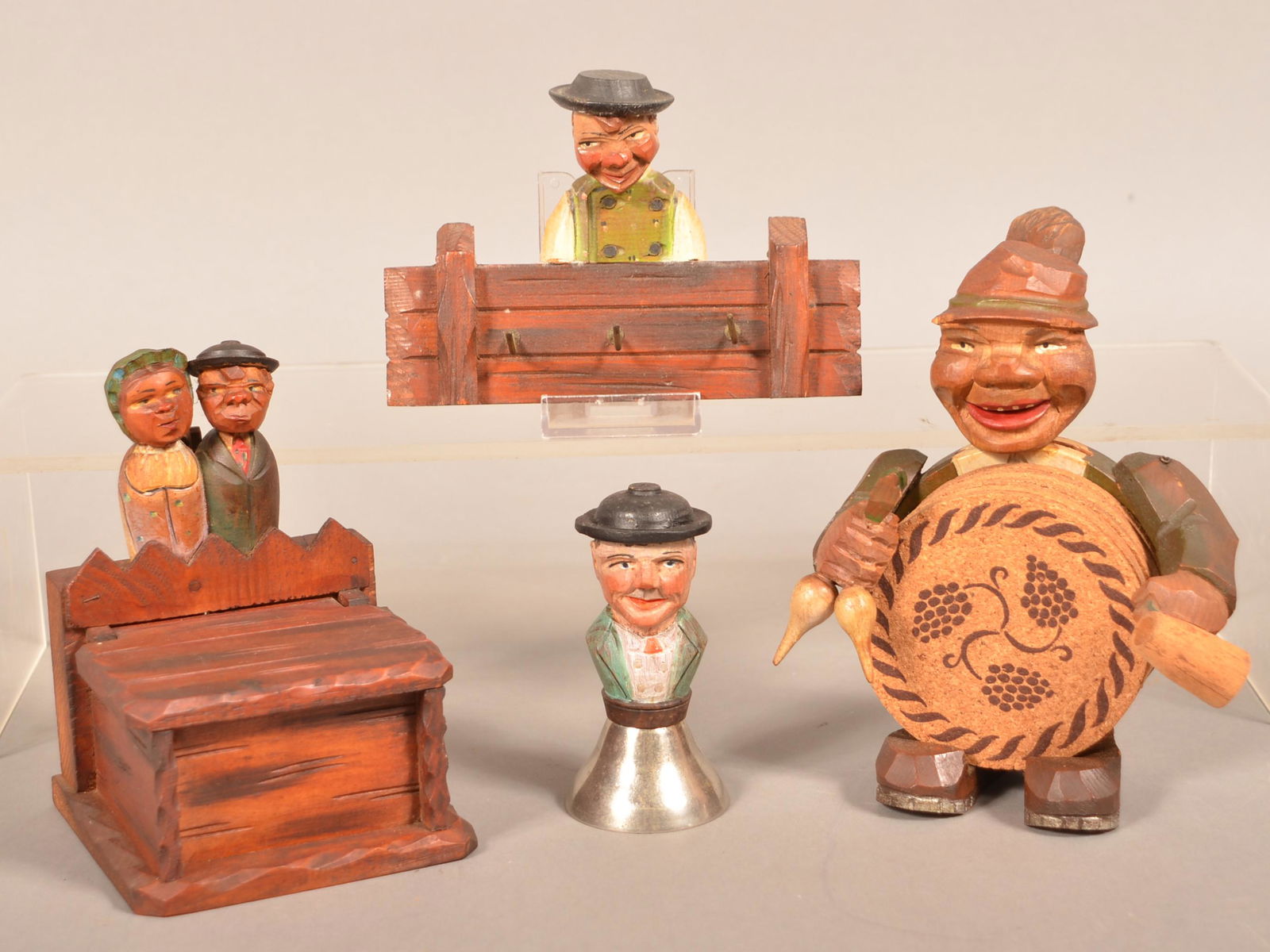 Four Anri Italian Hand-Carved Wood Figural Items.: Four Anri Italian Hand-Carved Wood Figural Items. Salt box, key holder, coaster set and hand bell. Tallest 6-1/2"h. Condition: Good with minor wear.